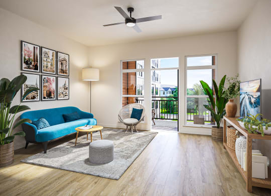 a living room with a blue couch and a ceiling fan